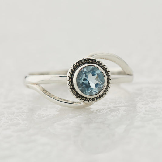 BLUE TOPAZ STERLING SILVER INFINITY RING