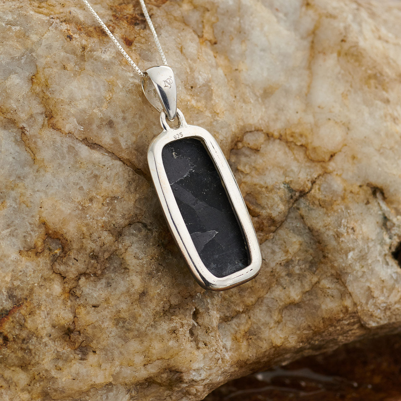 NUUMMITE STERLING SILVER PENDANT